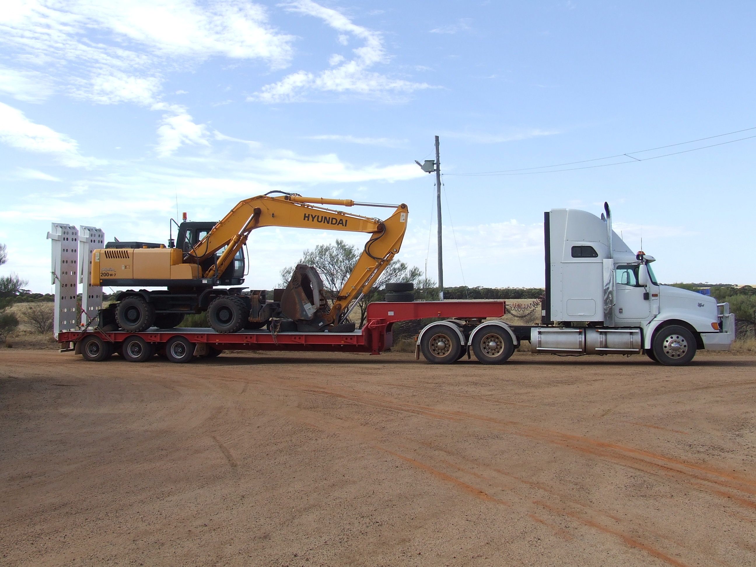 Excavator on the truck
